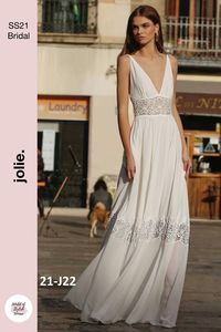 Embroidered Bohemian Empire Waist Wedding Dress / Bridal Gown with V-Neck Cut and Half Open Back. A good pick for Beach Wedding Dress. Spring Summer 2021 Bridal Collection by Jolie Bridal. Posted by World of Stylish Woman.