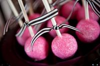 simple, but eye catching pink cakeballs w hot pink sprinkles & a contrasting ribbon!