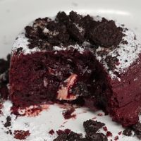 Cookies N Cream Red Lava Dream Cake. Decadent red velvet lava cakes with a gooey melted cookies and cream center.
