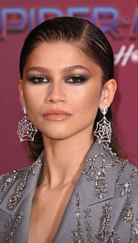 Zendaya in spider earrings & alexander mcqueen beaded blazer for spiderman no way home premiere red carpet