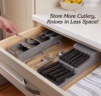 Store more cutlery, knives in less space! Smart cutlery storage angles and layers each compartment so you can stack loads of spoons and forks, plus serving pieces, peelers and more. Items can be placed either head or handle first. Has icons for easy identification. Fits drawers 3¼"H and above. Compact knife organizer safely stores large knives on the lower level and small knives on top. Holds up to 9 knives with blades up to 6"L. Polypropylene; nonslip feet.