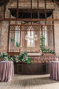 Leaf + Petal added lush garland of neutral and blush garden florals for a wedding at Felicity Church in New Orleans.