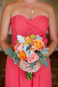 Bright coral bridesmaid dress and bouquet