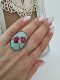 Check out this item in my Etsy shop https://www.etsy.com/listing/597780315/flower-epoxy-rings-real-flowers-jewelry