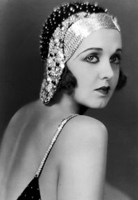 Actress Irene Delroy showing dramatic eyebrows.