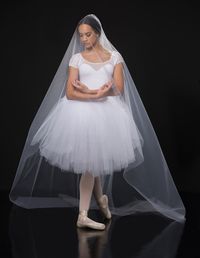 Leotard With Attached Skirt: White spandex, white stretch mesh, and white tulle ; Belt: (Removable) Velvet with ribbon ; Both Red And Royal Belts, Bow Headpieces, And Chokers Included; Veil Not Included ; #ballet #dancecostumes #dance #dancecompetition #artstonethecompetitor #balletdance