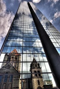 Trinity Church reflected in the glass of the John Hancock building