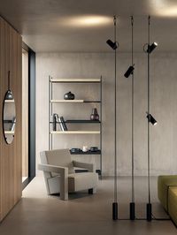 The Cima light, by Lodes, is inspired by the function of the jam cleats found in sailing boats, Cima - a nautical rope in Italian - is a “suspended” lamp characterised by a ceiling-to-floor rope, a sleek and highly functional design element. A joint that holds the lamp body slides vertically along the rope, while the counterweight allows to manage any excess rope. The simple cylindrical shapes and the black colour of these elements highlight the three brilliant finishes of the rope (gold, yellow
