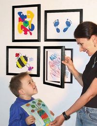easily interchangeable frames - that you don't have to take done to change the artwork/photograph. Great both for future kids and photos.