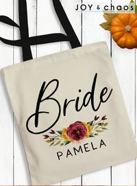 Add some floral fun to your bridal party with these custom fall tote bags. #floral #fallbridalparty #bridalparty #bridalgifts