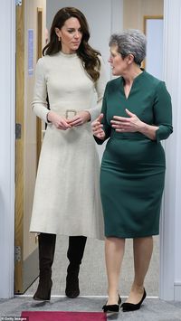 Princess in boots! Kate Middleton teams green coat with brown knee high boots for visit to Leeds
