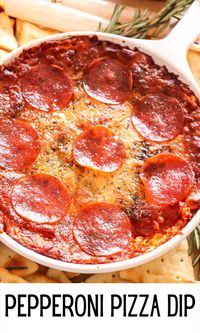 Pizza dip is a delicious layered baked dip with gooey, melted cheese, tomato sauce, and pepperoni. It is a quick and easy appetizer or snack that is ready in just 20 minutes. Grab your favorite breadsticks, crackers, veggies, or a fork, and dive in! #pizzadip #ketodiet #appetizers #christmasappetizers #partyappetizers