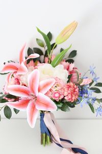 Create a stunning pink tropical wedding bouquet with artificial tropical flowers from Afloral.com. #weddingflowers #weddingbouquet