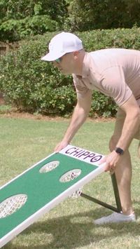 Golf-centric backyard game · High-density foam balls have true spin and trajectory · Easy to stow. The Chippo Outdoor Golf Game combines cornhole and chip shots to make for a fun new golf-centric backyard game. Golfing buddies (or solo players) can use their own clubs to hit from turf-covered chipping mats into the netted holes. High-density foam balls have true spin and trajectory so they feel like the real thing, but won’t cause damage like a real ball can.