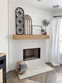 Come see how we gave a boring builder-grade fireplace a custom look in just one afternoon!