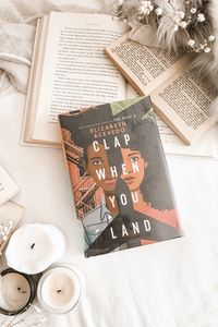 Clap When You Land by Elizabeth Acevedo | Elizabeth Acevedo is a new to me author. But within a few months I already read THREE books by her. My favorite is WITH THE FIRE ON HIGH which I adored. But it became quickly clear that I really enjoy her writing and I’m looking forward to more of her books. #youngadultbooks #yabooks #bipoc #elizabethacevedo #clapwhenyouland #poetx #freeverse #bookreview #audiobookreview #bookblog #bookstagram #audiobookreview