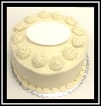 This is the ONLY style of design that we offer on vegan cakes. We can change the color of the sprinkles or add photoart to the top. A message can be written in non-vegan buttercream on a removable plaque.