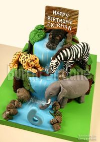 Jungle themed cake personally I love this I have always loved wild animals so I just fell in love with this cake.