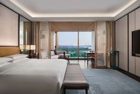 The luxury hotel, located near freshwater Jinji Lake in the heart of Suzhou Industrial Park, was designed by New York architectural firm, Kohn Pedersen Fox, and features interiors by Hirsch Bedner Associates. It features 178 rooms and suites range from 50 to 173m2 "inspired by the sleeping chambers of Ancient Suzhou mansions". There are three restaurants and bars, a fitness centre, a spa and a swimming pool.