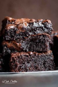 The Best, Fudgy ONE BOWL Cocoa Brownies! A special addition gives these brownies a super fudgy centre without losing that crispy, crackly top! | https://cafedelites.com