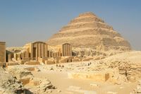 Saqqara - Pyramid of Djoser - The Pyramid of Djoser, or step pyramid is an archeological remain in the Saqqara necropolis, Egypt, northwest of the city of Memphis. It was built during the 27th century BC for the burial of Pharaoh Djoser by Imhotep, his vizier. It is the central feature of a vast mortuary complex in an enormous courtyard surrounded by ceremonial structures and decoration.