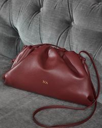 #ad Our bordeaux jeanie clutch bag adds a touch of class to any outfit. Embodying a minimalist look, our jeanie clutch has been crafted from soft leather and is detailed with your initials in gold. It can be worn cross body with a long strap or as a clutch bag for an evening event. Initials. Best Luxury Designer High End Purse