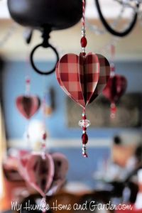 Homemade Valentine decorations are often prettier than store-bought decorations. Easy DIY hanging hearts decorated with beads and buttons are definitely some of the prettiest. I saw the idea for these beaded Valentine hearts on Pinterest and couldn't resist making some! Click thru for how to make your own.
