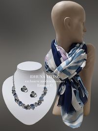 Exclusieve en soepele damessjaal in blauwtinten en wit-roze