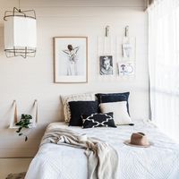 Instead of a side table on the floor, think about a floating / suspended side table. This will also give you greater floor space if you have a small bedroom. Image courtesy, H and G Designs