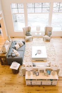 A bright and airy light-filled living room would be delightful for entertaining family and friends and connecting to the outdoors, drawing nature in.
