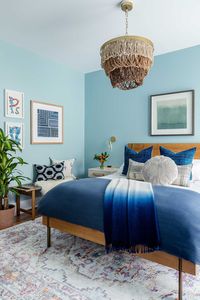 Looking for the best light blue paint? A coat of Nairobi Blue paint by Clare and light, airy accents turned this blue bedroom into a sanctuary. #lightbluepaint #bluepaint #bluebedroom #bedroomideas #bedroominspo #bedroominspiration #bedroommakeover #relaxingbedroom