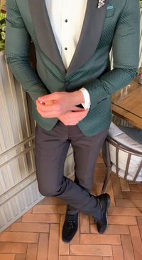 279$ Collection: Fall – Winter 19/20 Product: WN Dark Green Slım Fıt Tuxedo Color Code: Dark Green Available Size: EU 46/ US 36 ( 60kg - 70kg) EU 48/ US 38 ( 70kg - 75kg) EU 50/ US 40 ( 75kg - 80kg) EU 52/ US 42 ( 80kg - 85kg) EU 54/ US 44 ( 85kg - 90kg) EU 56/ US 46 ( 90kg - 95kg) Suit Material: 60% Viscose, 20% polyester, 20% wool Machine Washable: No Fitting: Slim-Fit Package Include: Jacket, Pants.