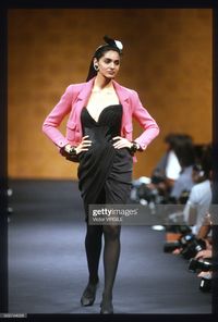 News Photo : A model walks the runway during the Chanel Haute...