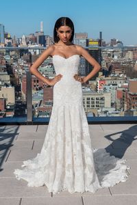 This stunning strapless allover lace gown features a sweetheart neckline and a dropped waistline. Lightly sequined appliques are uniquely placed throughout the bodice down through the A-line skirt. The chapel length train is finished with sequin hem lace. Also available with a 72 inch train.