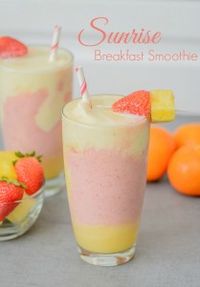 Tropical Breakfast Smoothie // very good, I used 1 cup coconut water and 1 cup goats milk to sub instead of the yogurt. I used frozen mangos and frozen strawberries instead of pineapple. And a fresh orange with 2 TBSP of coconut oil. Very good power breakfast Smoothie, very creamy!