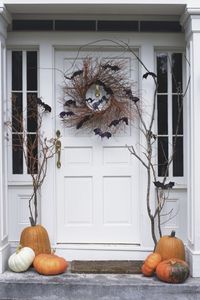 This Halloween we recommend that you swap your blow up Frankenstein with charming white pumpkin ghosts and mini gourd candle sticks.