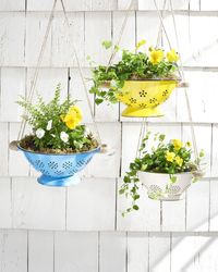 colanders for hanging planters - 46 Cheerful & Fun Craft Projects for Spring - CountryLiving.com