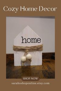 These adorable wood homes are perfect for any room in the house. With the mix of textures it brings a tiered tray or bookshelf to life. With its natural wood grain and twine features it works with all decor.