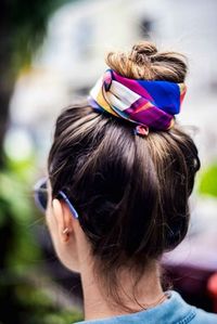 Scarf tied around a bun.