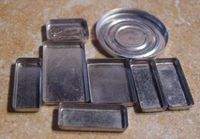 Save the metal tins from eyeshadow containers for baking tins. now they look like bezels to | http://awesomejewelrycollections.blogspot.com