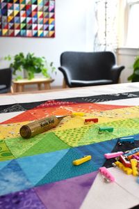 Learn how to cut and piece the quilt top for the Straight Ally Pride mini-quilt! This quilt is created using half-square triangles, and it is made entirely from scraps. Find the full tutorial on the blog at weallsew.com.