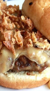 Chicken Fried Steak Burgers with Vidalia Onion Gravy. Comfort food at its finest! Try these burgers on Martin's Potato Rolls!