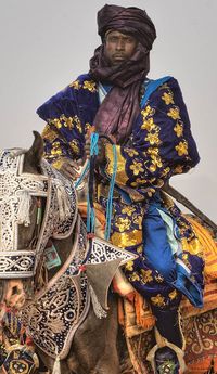 Previous pinner wrote: "Africa. The Hausa people. His beauty comes from his command of the horse and the clothing."