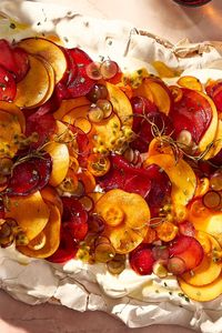 NYT Cooking: A pavlova is among the best desserts to serve at a dinner party, as it brings the wow factor but is also very forgiving. If the meringue cracks in places, you don’t need to fuss as you’ll be covering it with cream and fruit. You can play with the flavoring of the cream and change up the fruits. If you can’t find kumquats, feel free to swap them out for muscat or green seedless grapes, or an ora...