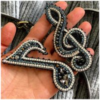 Musical note beaded brooch,musical note brooch Pin,Music Note,Musical Brooch,musical note pin, music themed jewellery,Gift for Her #beaded #brooch #pattern #beadedbroochpattern Musical note beaded brooch,musical note brooch Pin,Music Note,Musical Brooch,musical note pin, music themed jewellery,Gift for Her Handmade bead embroidery brooch. Wool Felt on the other side. Materials used: rhynstones tape, toho Japanese beads, swarovski pearls, hemamit stones, crystals,wool felt, french wire Brooch sti