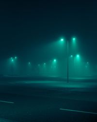 Adrian Wojitas' Dystopian Images Explore a Foggy Irish Town Drenched in Aquamarine Light | Colossal