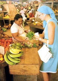 Princess Grace shopping while on vacation in Jamaica, 1967. Photo by Howell Conant.