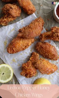 Lemon Pepper Honey chicken wings where the honey is infused with a nice lemon pepper flavor and then drizzled over extra crispy, lightly breaded chicken wings to create the perfect balance of savory sweet! #recipe #lemonpepperwings #chicken #wings #sweetandsavorymeals #crispy #honey