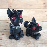 Hellhound pups! The eyes actually have a bit of a glowing effect to make them extra spooky :) #cute #halloween #spooky #hellhound #helldog #dog #blackdog #sculpey #clay #premo #dragonsandbeasties