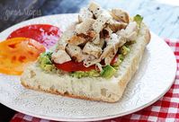Grilled Chicken Sandwich with Avocado and Tomato - An open faced sandwich on Ciabatta bread with mashed avocado, sliced tomatoes and grilled chicken. A perfect way to use up leftover chicken.